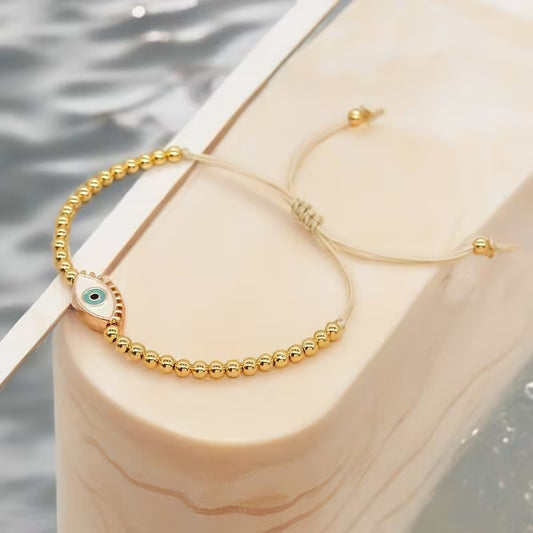 Protected Glow | Evil Eye Gold Bead Bracelet
