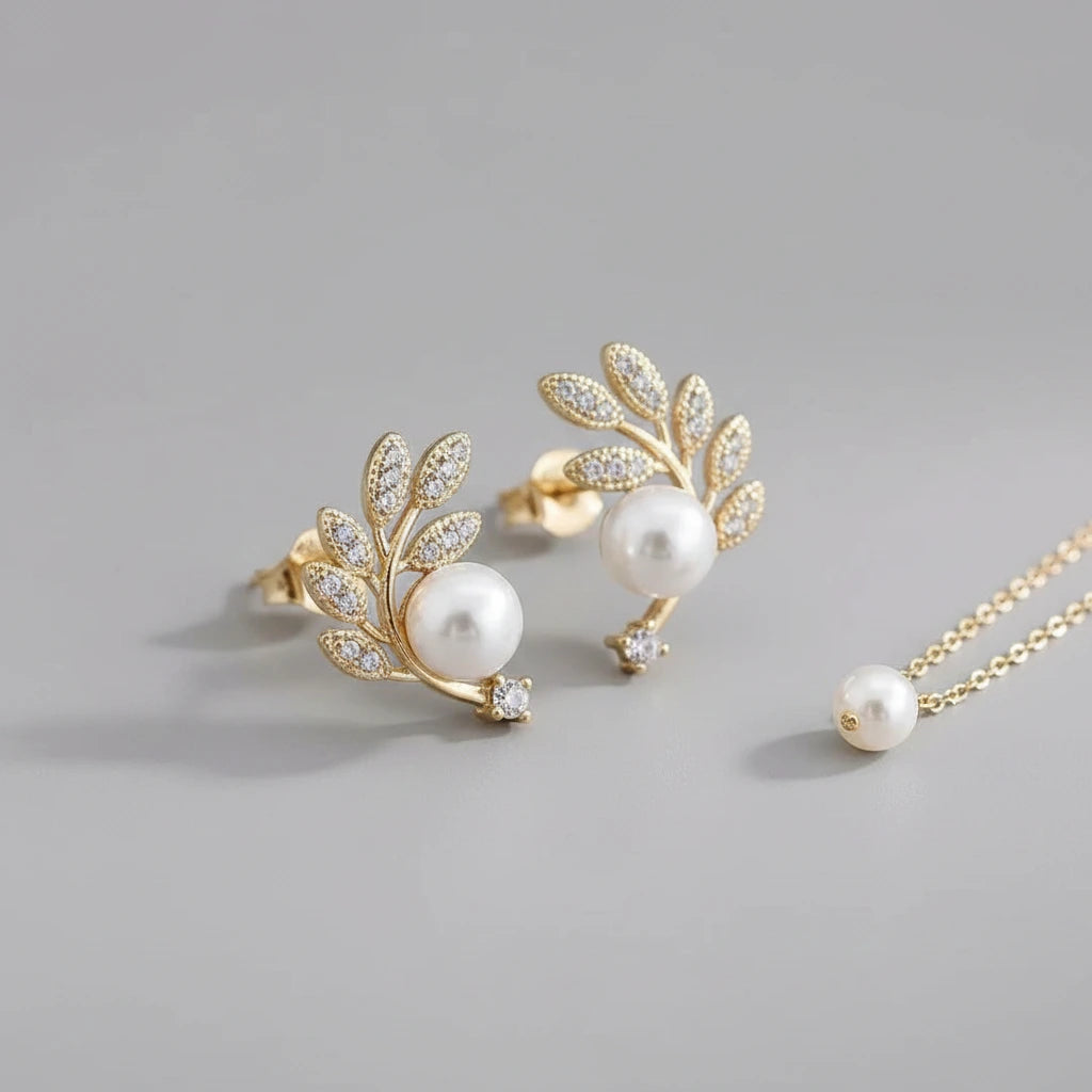 Gilded Pearl Studs — Side Angle