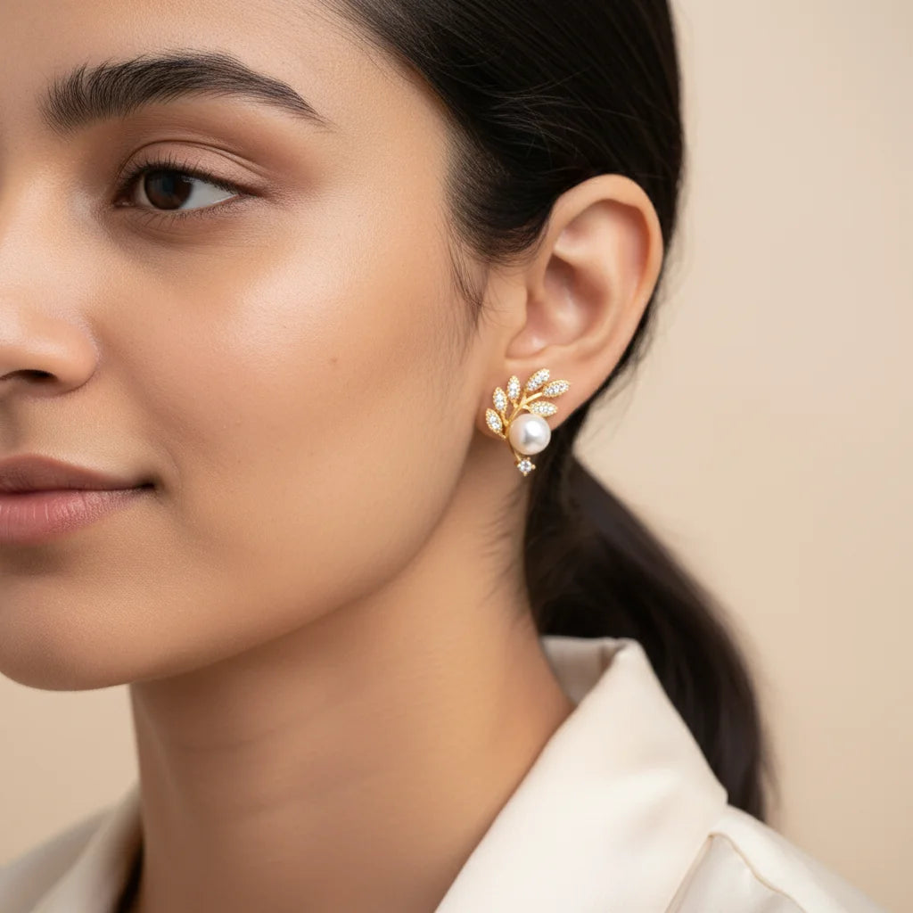 Gilded Pearl Studs — Worn Close-up