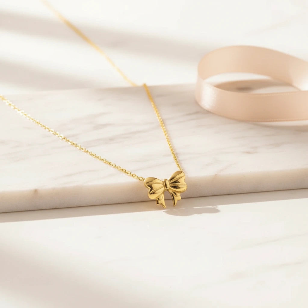 Gold Bow Necklace — Luxe Marble