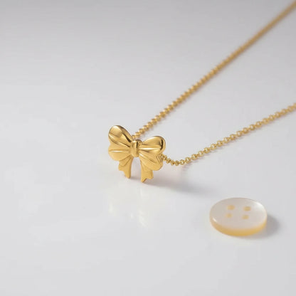 Gold Bow Necklace — Side Angle