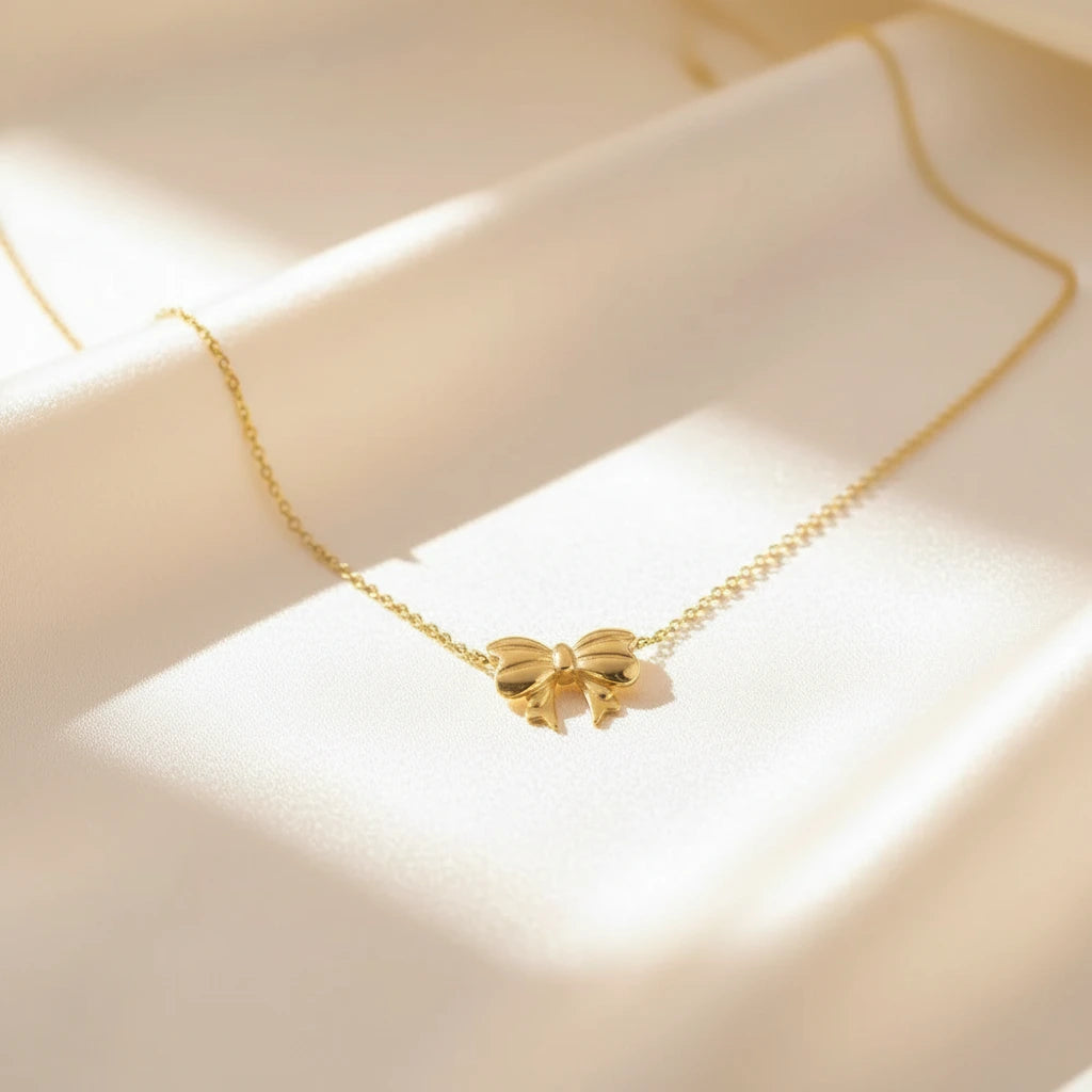 Gold Bow Necklace — Velvet Pedestal