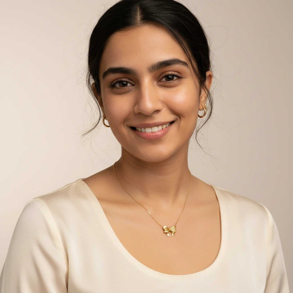 Gold Bow Necklace — Worn on Model