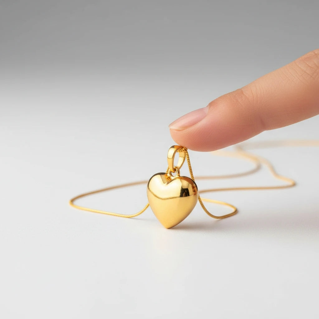 Gold Heart Pendant — Side Angle