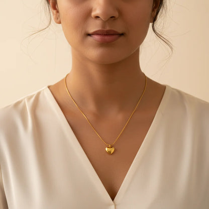 Gold Heart Pendant — Worn Close-up