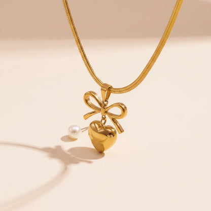 Golden Bow Necklace — Side Angle