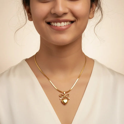 Golden Bow Necklace — Worn Close-up