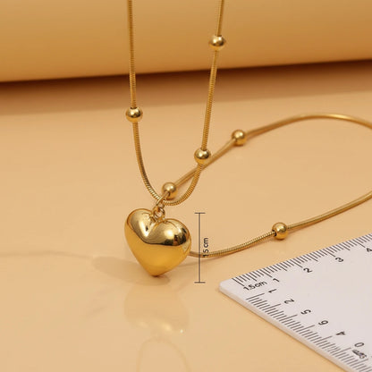 Golden Heart Chain Necklace — Side Angle