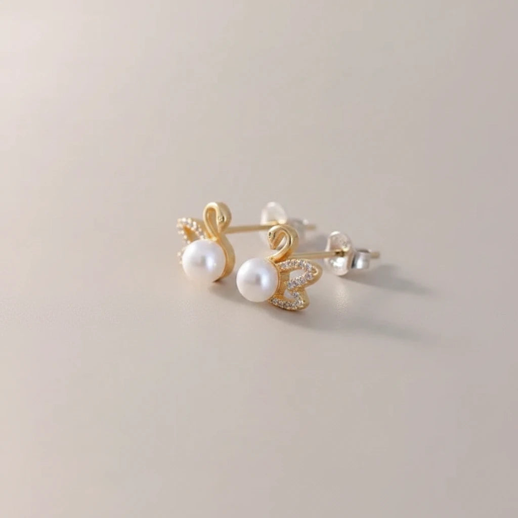 Pearl Swan Studs — Side Angle
