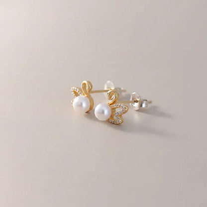 Pearl Swan Studs — Side Angle