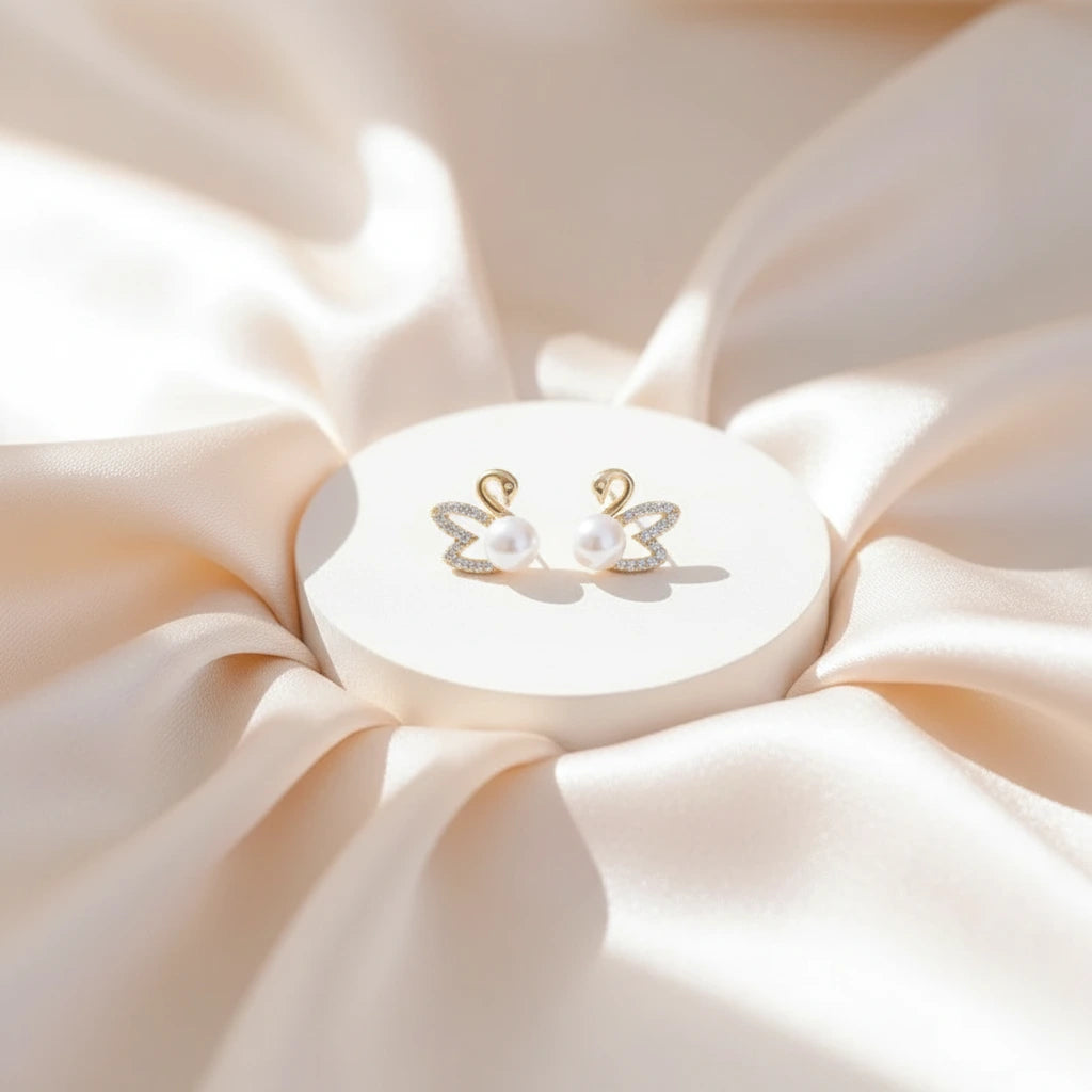 Pearl Swan Studs — Velvet Pedestal