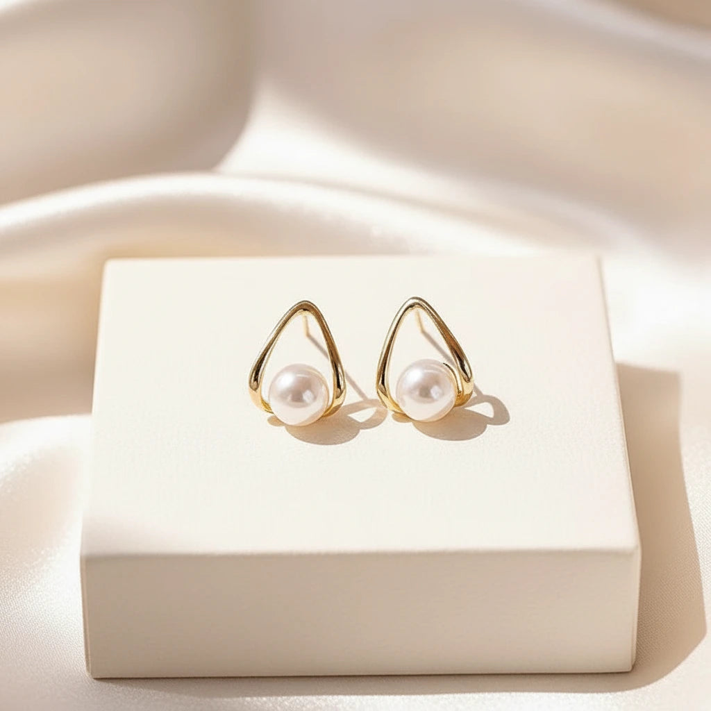 Teardrop Pearl Studs — Velvet Pedestal