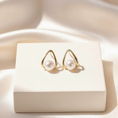 Teardrop Pearl Studs — Velvet Pedestal