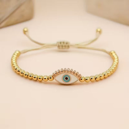 Protected Glow | Evil Eye Gold Bead Bracelet