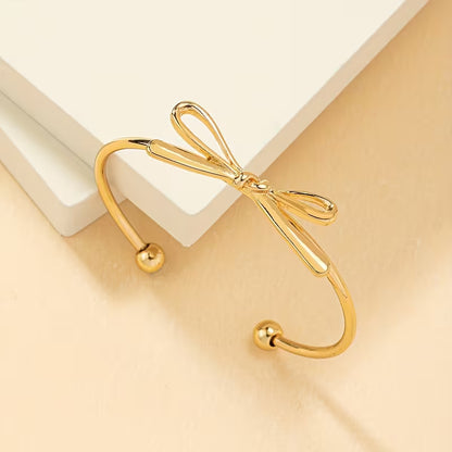 Tied With Intent | Bow Open Bangle