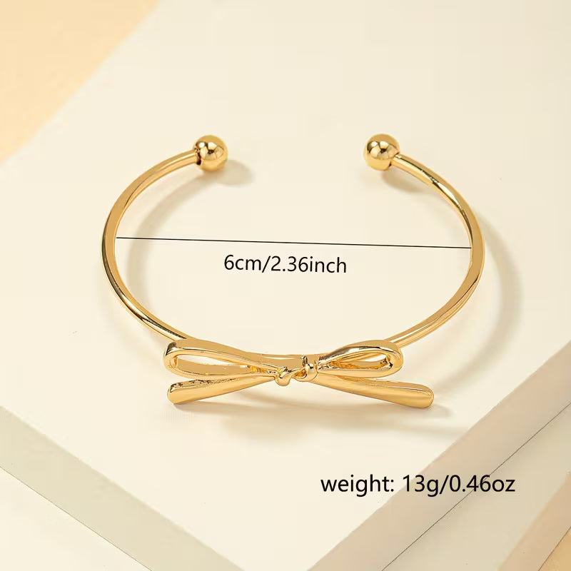 Tied With Intent | Bow Open Bangle