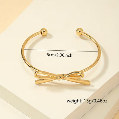 Tied With Intent | Bow Open Bangle